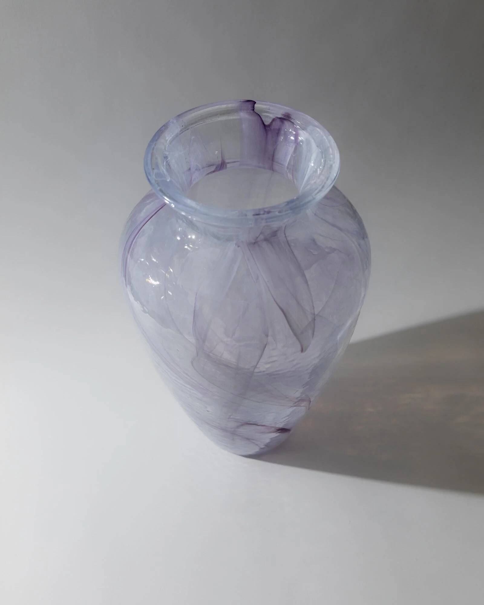 Vintage Murano glass vase from the 1970s, lilac and white swirl.