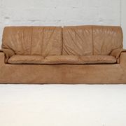 Cinna sofa. Circa 1970. Foam and "caramel" leather. 3 seats.