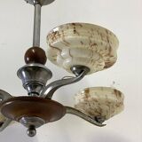 Art Deco chandelier in wood, chrome metal, and glass.