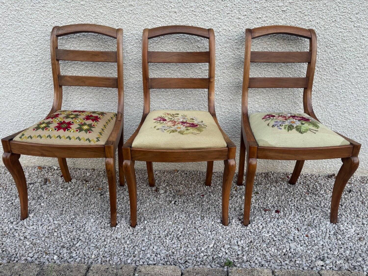 Set of three Louis XV chairs in solid walnut with petit point upholstery from the 19th century.