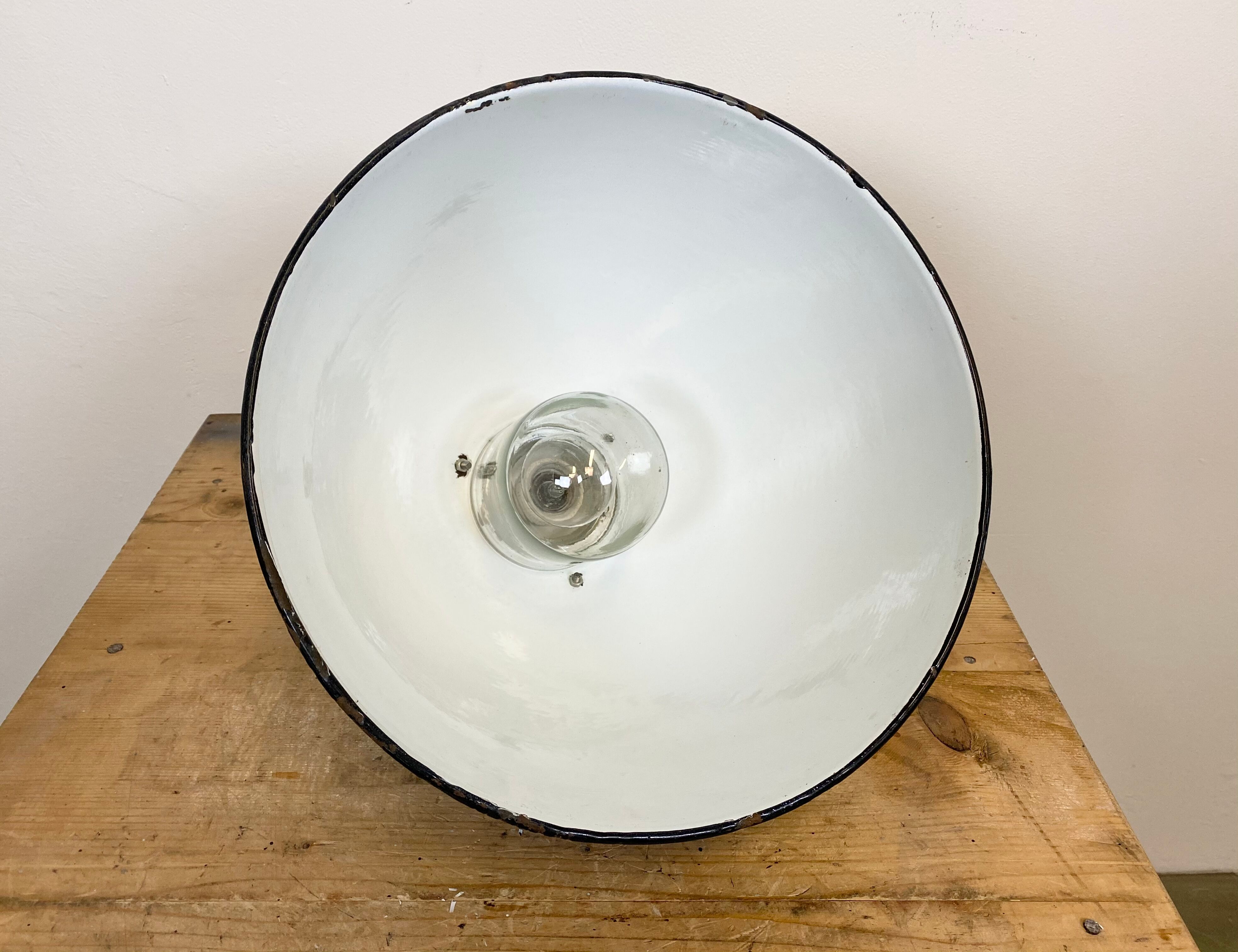 Industrial black enamel lamp with porcelain top, 1950s