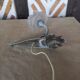 Art deco swan neck wall light with pink shade
