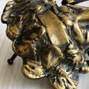 Large antique style brass metal knocker.