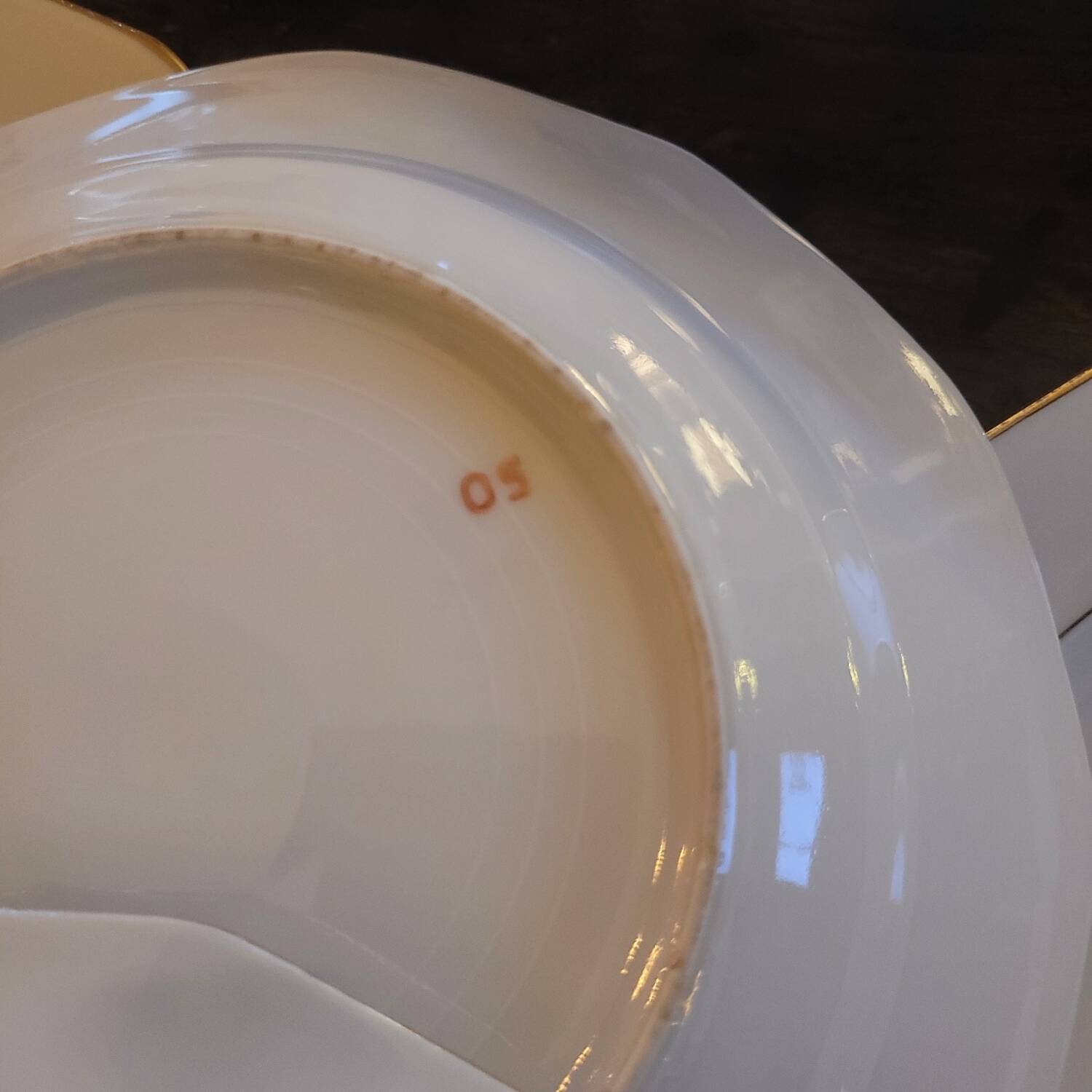 Porcelain soup plates - Decorated with small flowers and a gold rim
