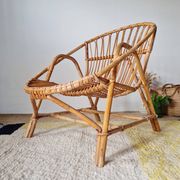 Fauteuil corbeille vintage en rotin – années 60