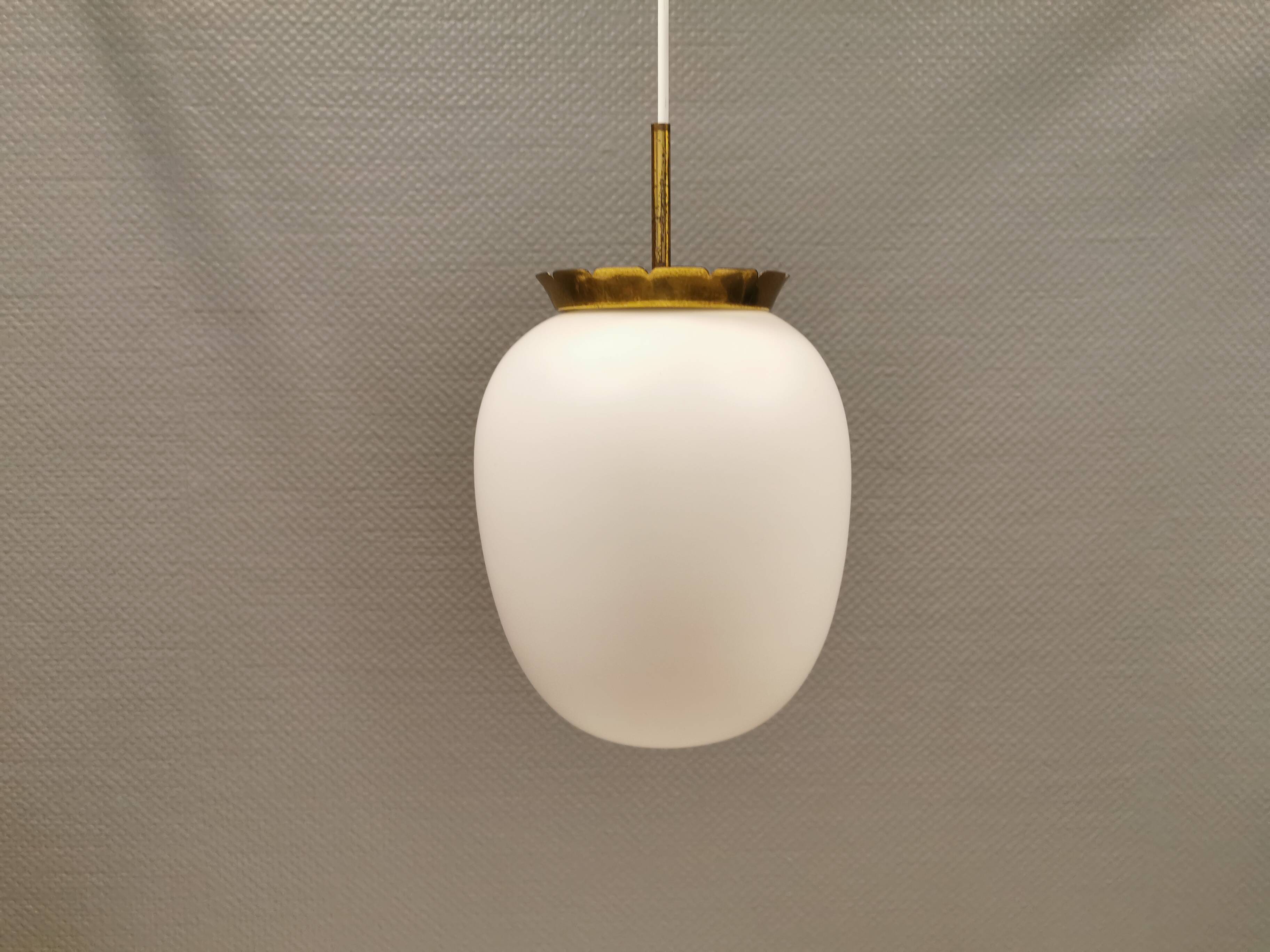 Old hanging lamp in milky white opal glass and brass top/suspension. Danish design 1930s