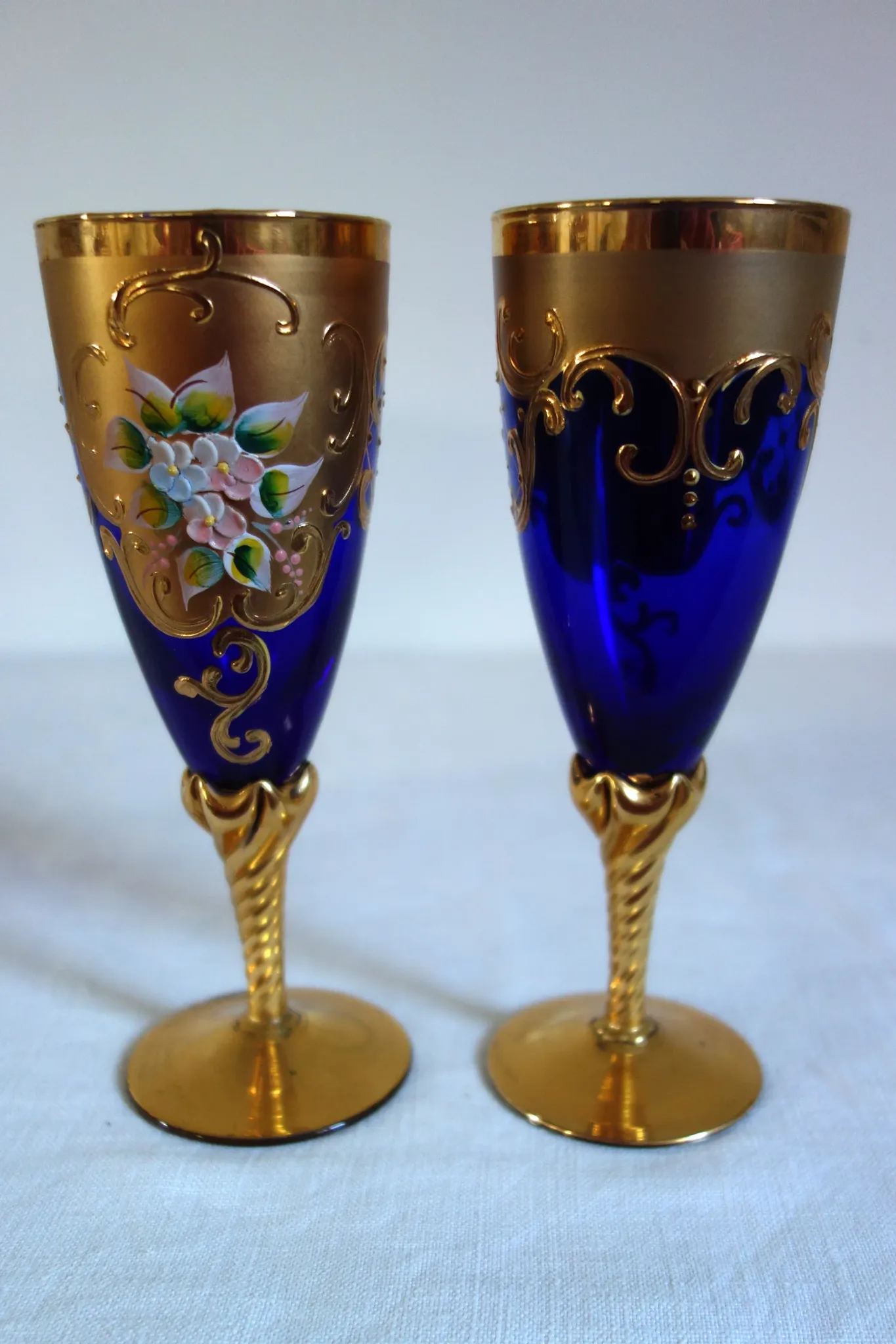 12 cobalt blue and gold Murano glass flutes, mid-20th century.