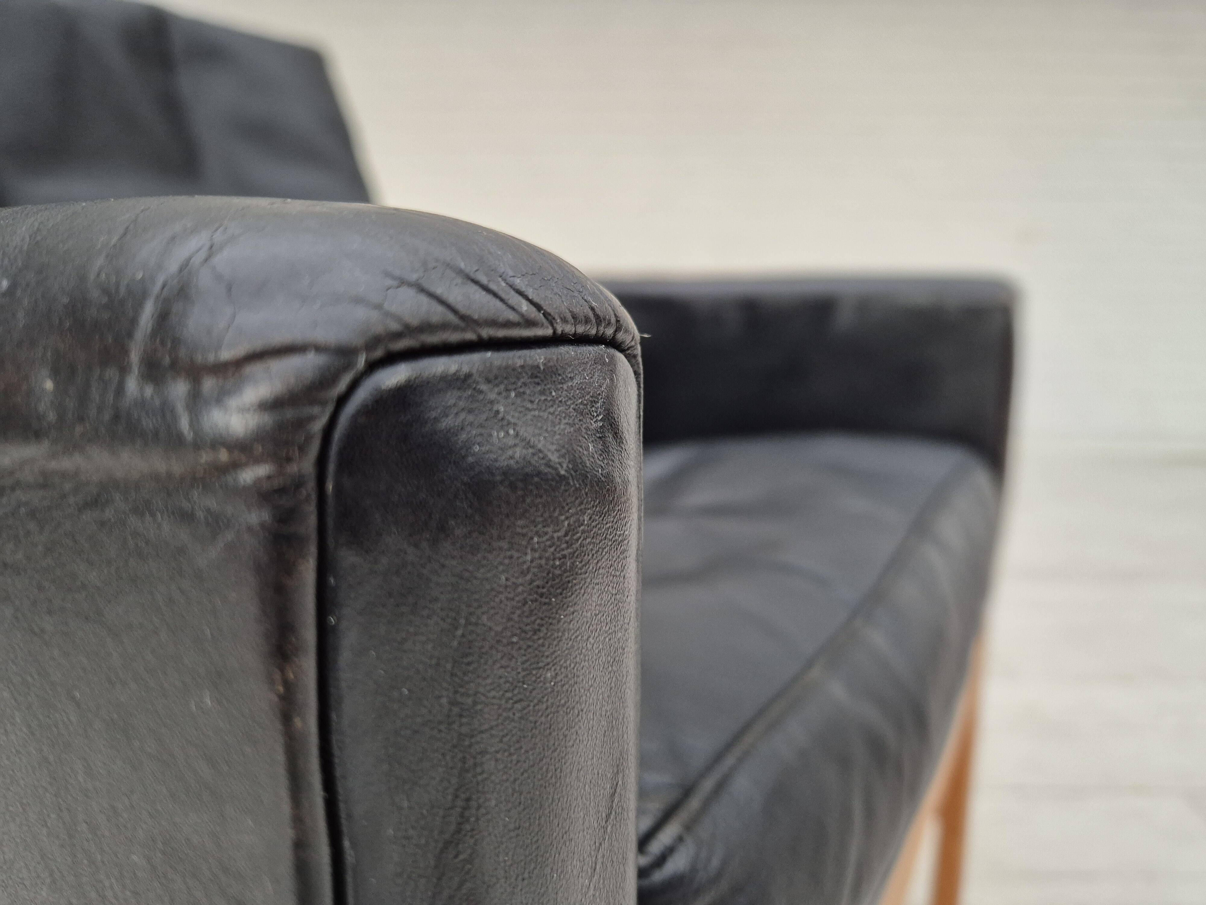 1960s, Danish lounge chair, original condition, furniture leather, solid oak wood.