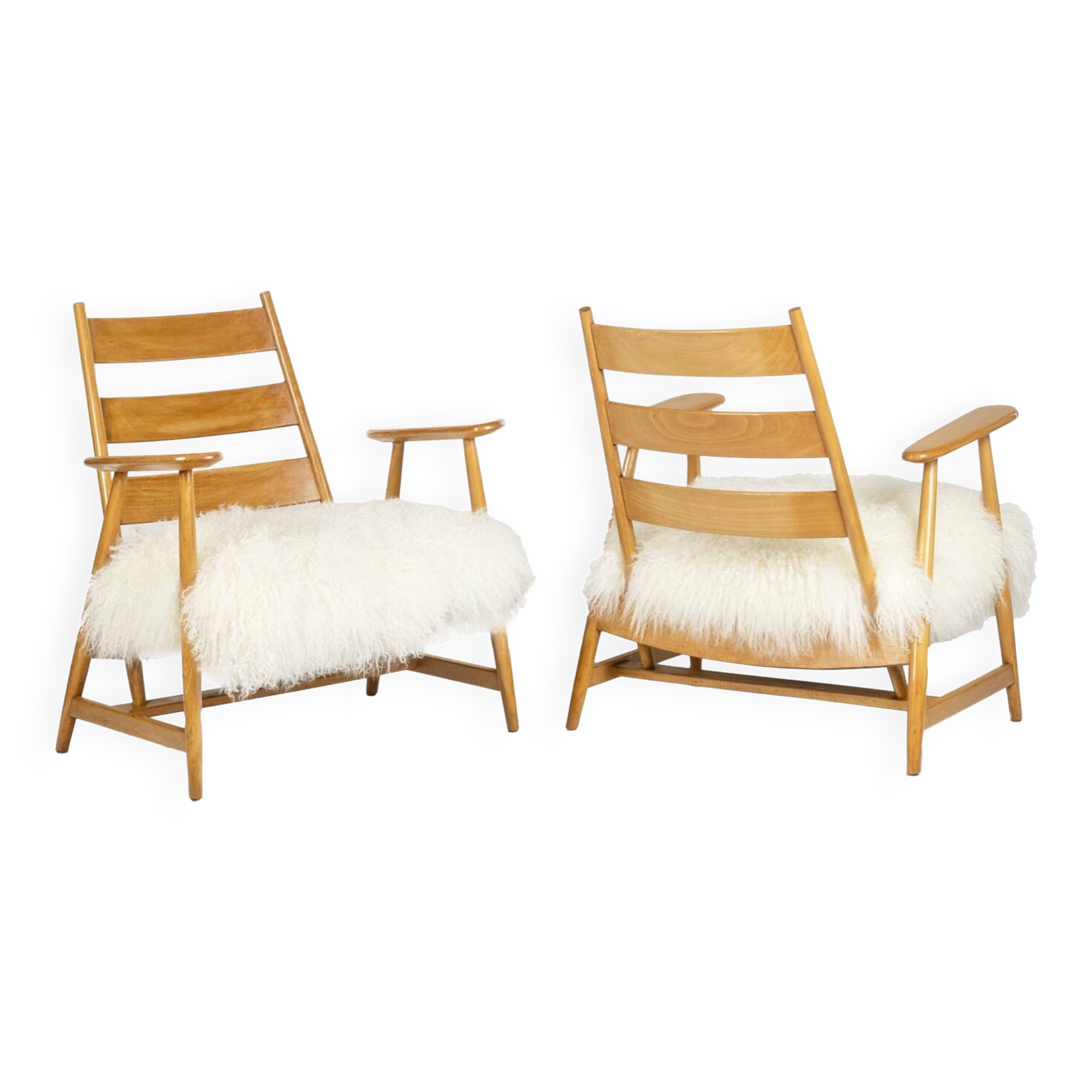 Pair of “lounge” armchairs in blond beech. 1950s