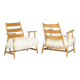 Pair of “lounge” armchairs in blond beech. 1950s