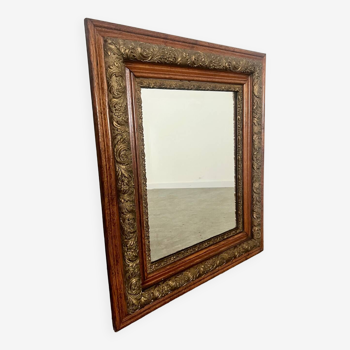 Old mirror in oak and gilded wood early 20th century beveled glass