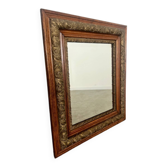 Old mirror in oak and gilded wood early 20th century beveled glass