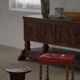 Twisted barley stool in Danish baroque oak with a red leather seat, early 20th century.