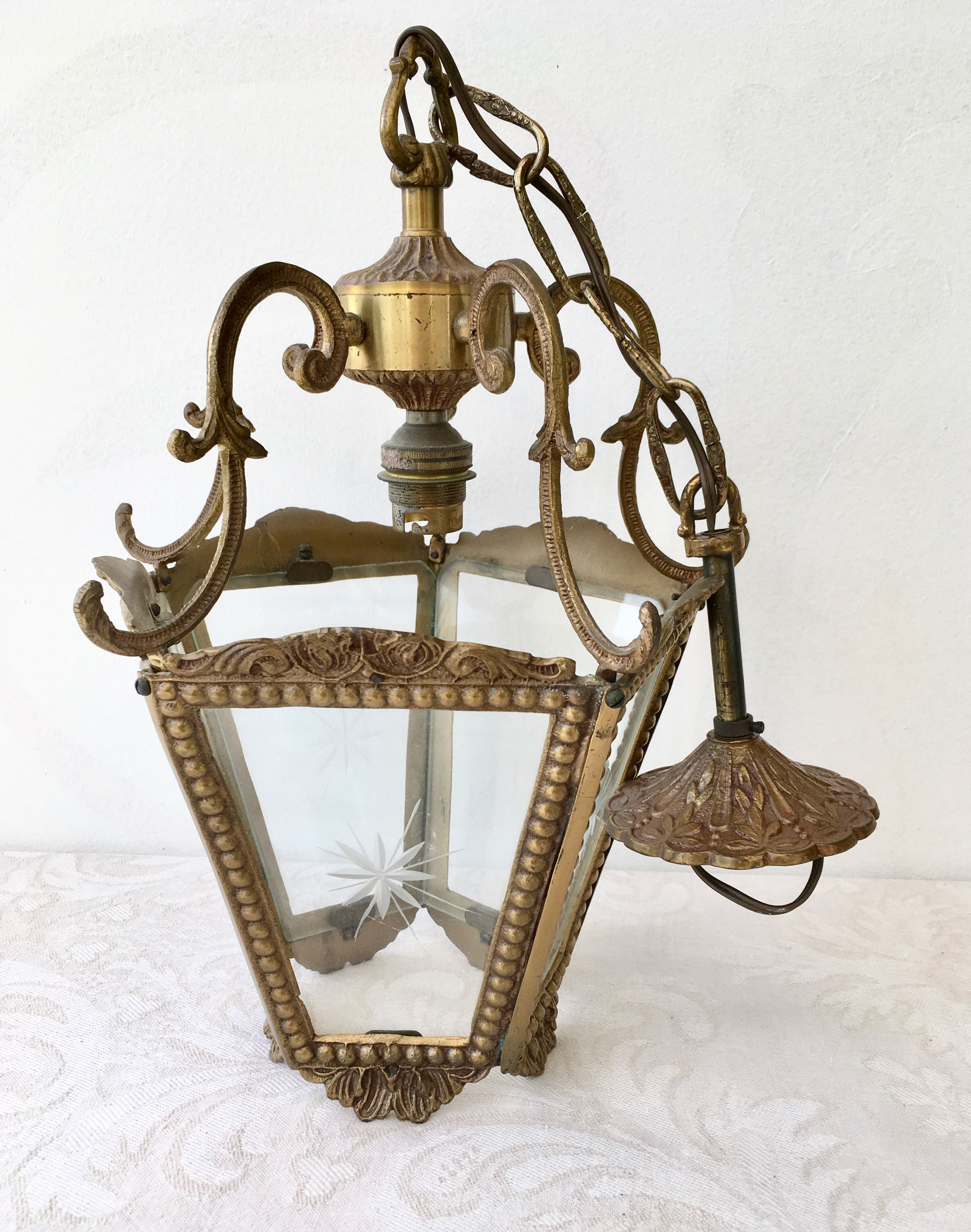 Hanging brass lantern and engraved glass