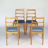 Set of four blue velvet Scandinavian chairs.