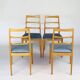 Set of four blue velvet Scandinavian chairs.