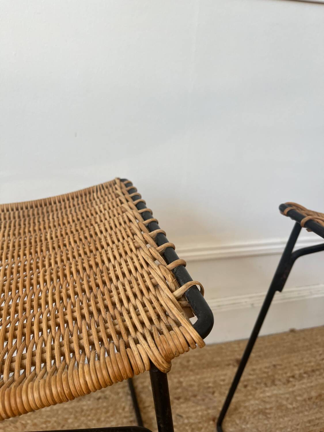 Pair of Raoul Guys stools for Airborne in wicker 1950