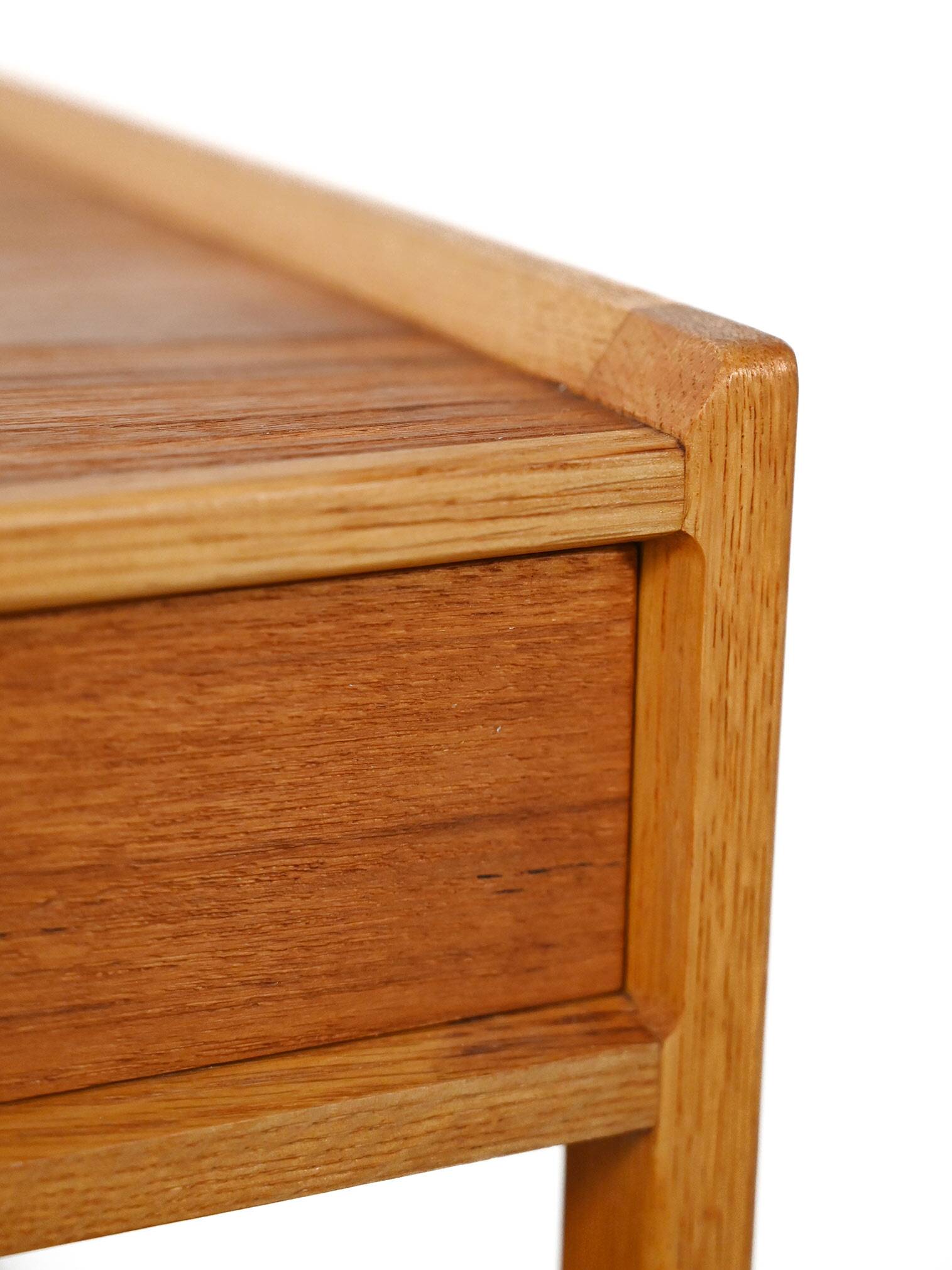 Pair of Scandinavian bedside tables from the 1950s–60s with carved handle