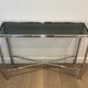 Console and chrome faux-bamboo mirror