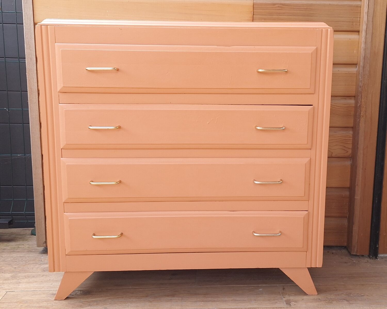 Pretty vintage salmon chest of drawers.
