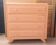 Pretty vintage salmon chest of drawers.