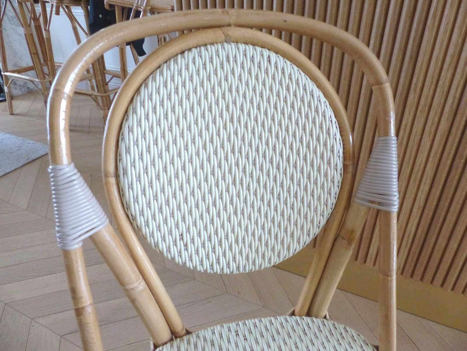 Pair of Parisian bistro chairs from Maison Louis Drucker in light Manila rattan.