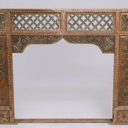 Old façade or decorative frame in carved wood, of Indian origin.