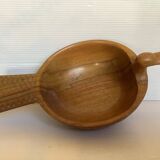 Carved wooden bird pocket