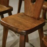 8 chaises brutalistes en orme massif par Aranjou 1950’s