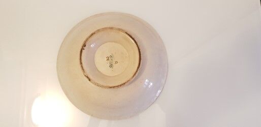Old porcelain dish on pedestal
