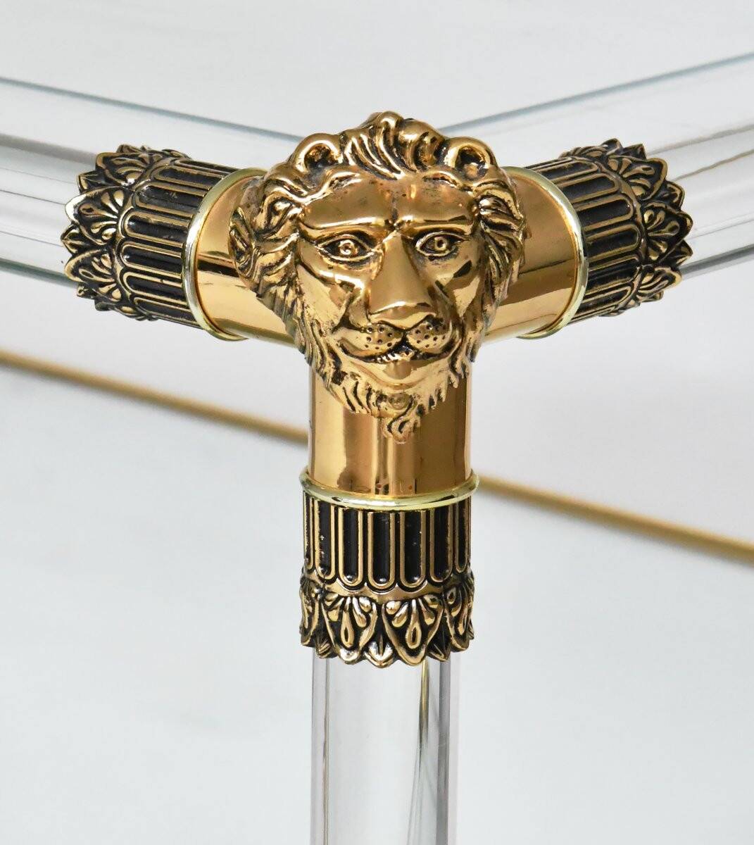 Plexiglass coffee table in Hollywood Regency style