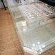 Italian travertine, perspex and glass coffee table, circa 1970