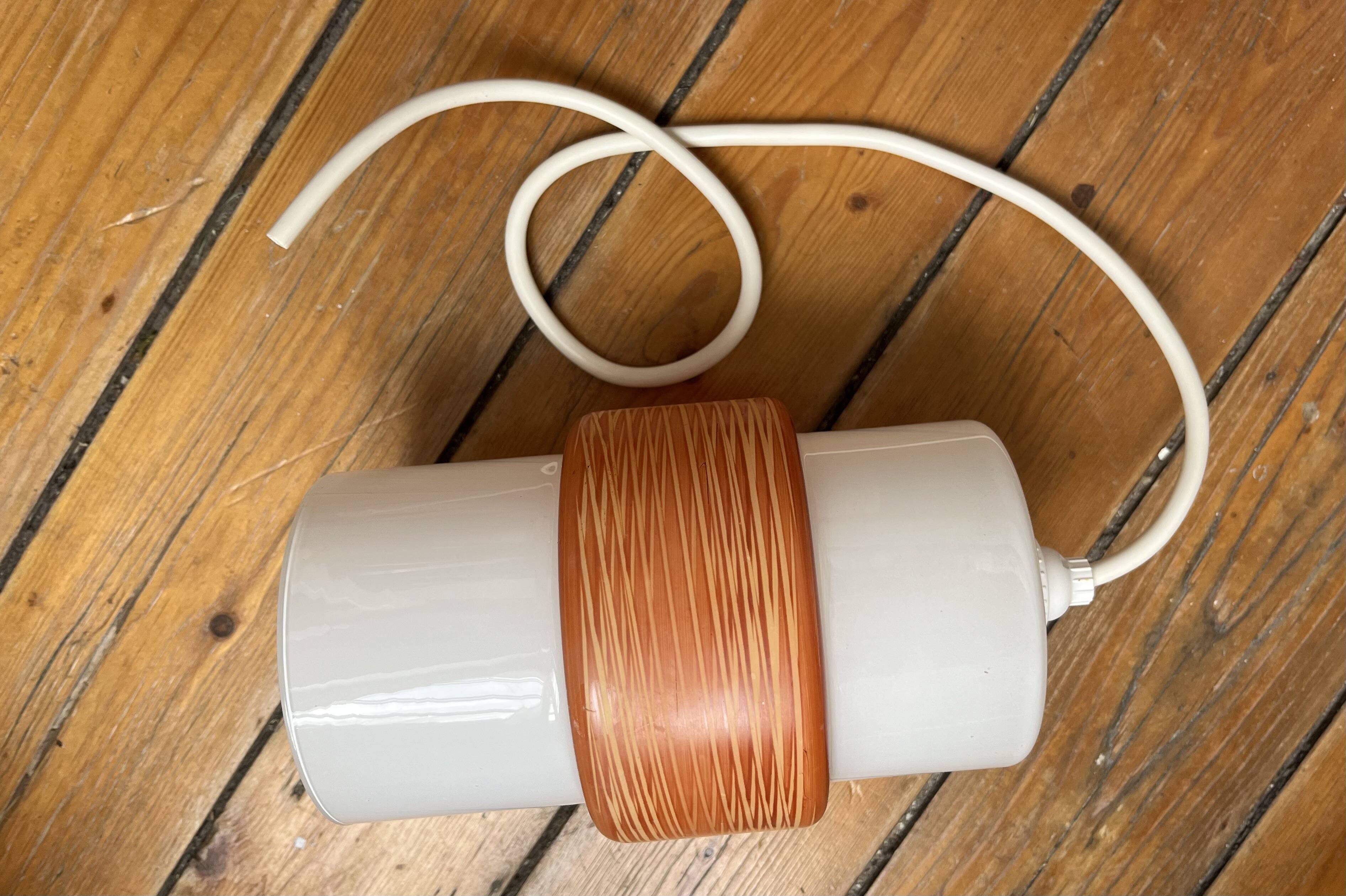 Sputnik pendant light, dark orange ring on white tube