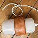 Sputnik pendant light, dark orange ring on white tube