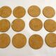 Set of 12 Mother of Pearl coasters with brass edging.