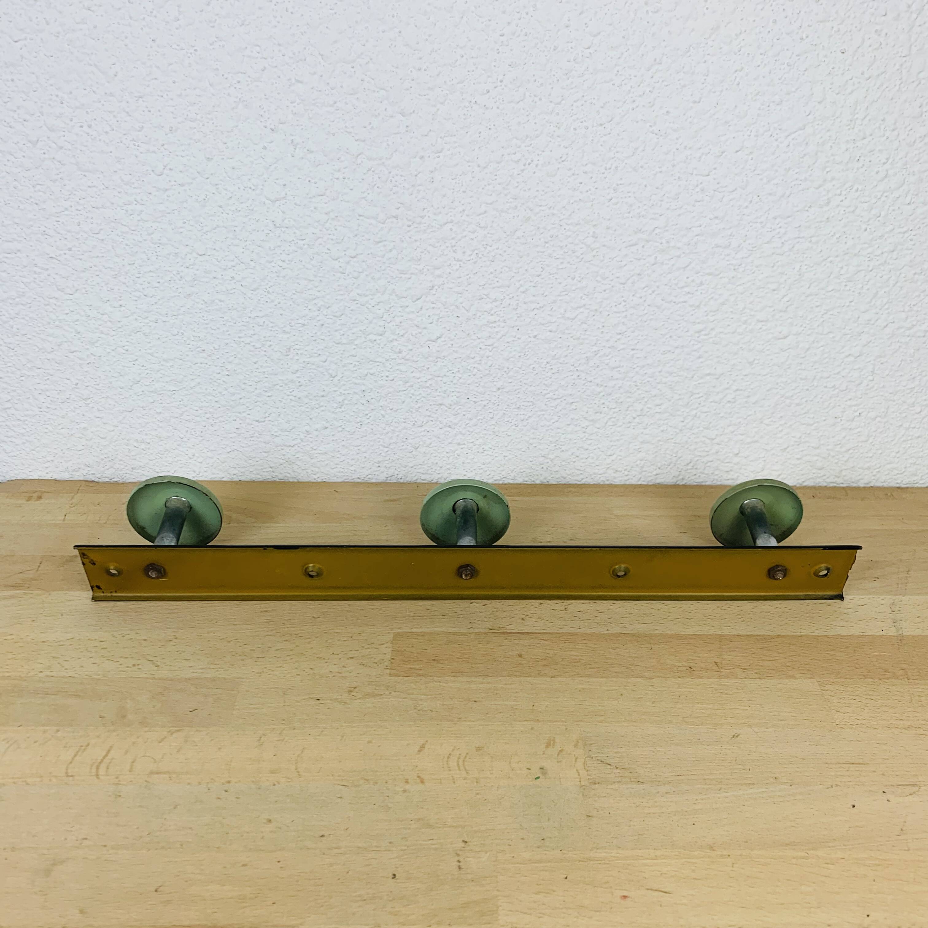 Wall coat rack with 3 hooks from the 1950s