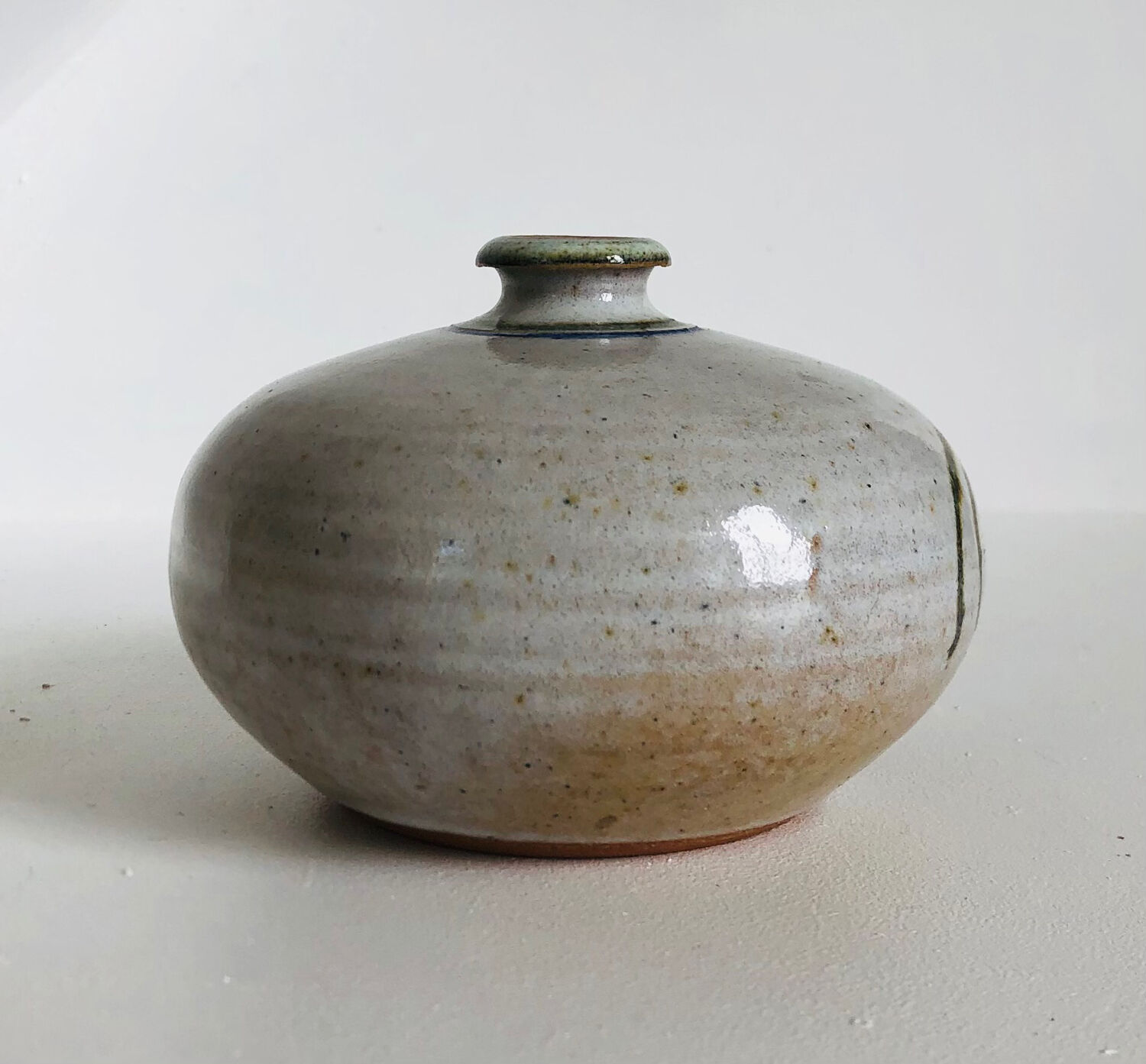 Ceramic bud vase with floral decoration