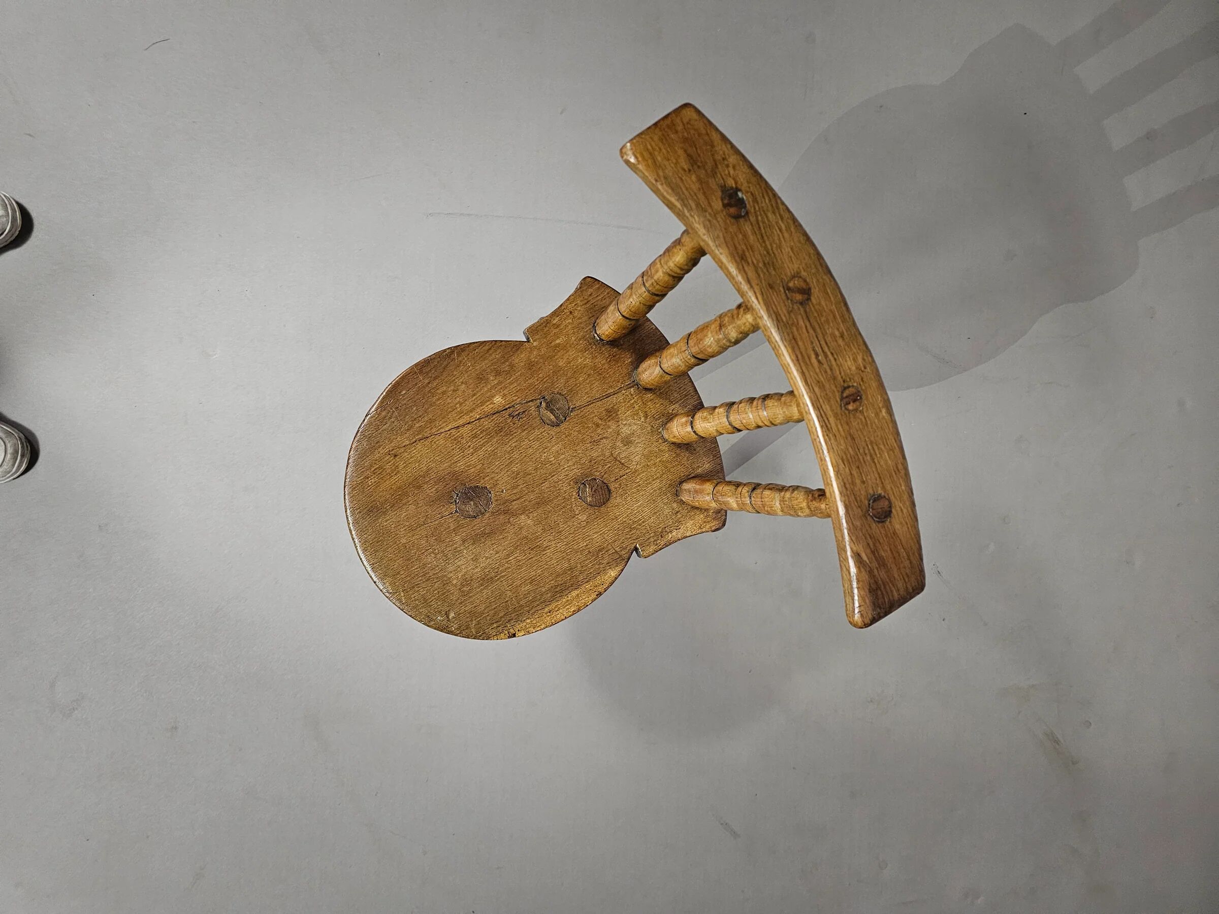 Old farmers tripod chair for decorative use