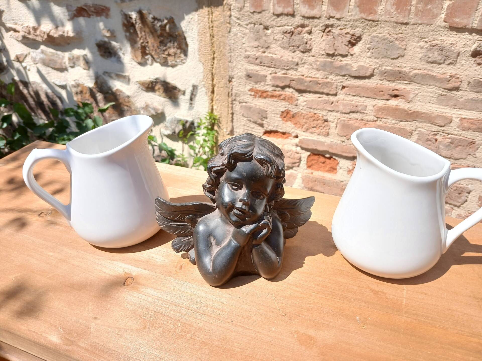 2 vintage milk jugs