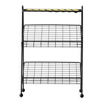 Black metal magazine rack