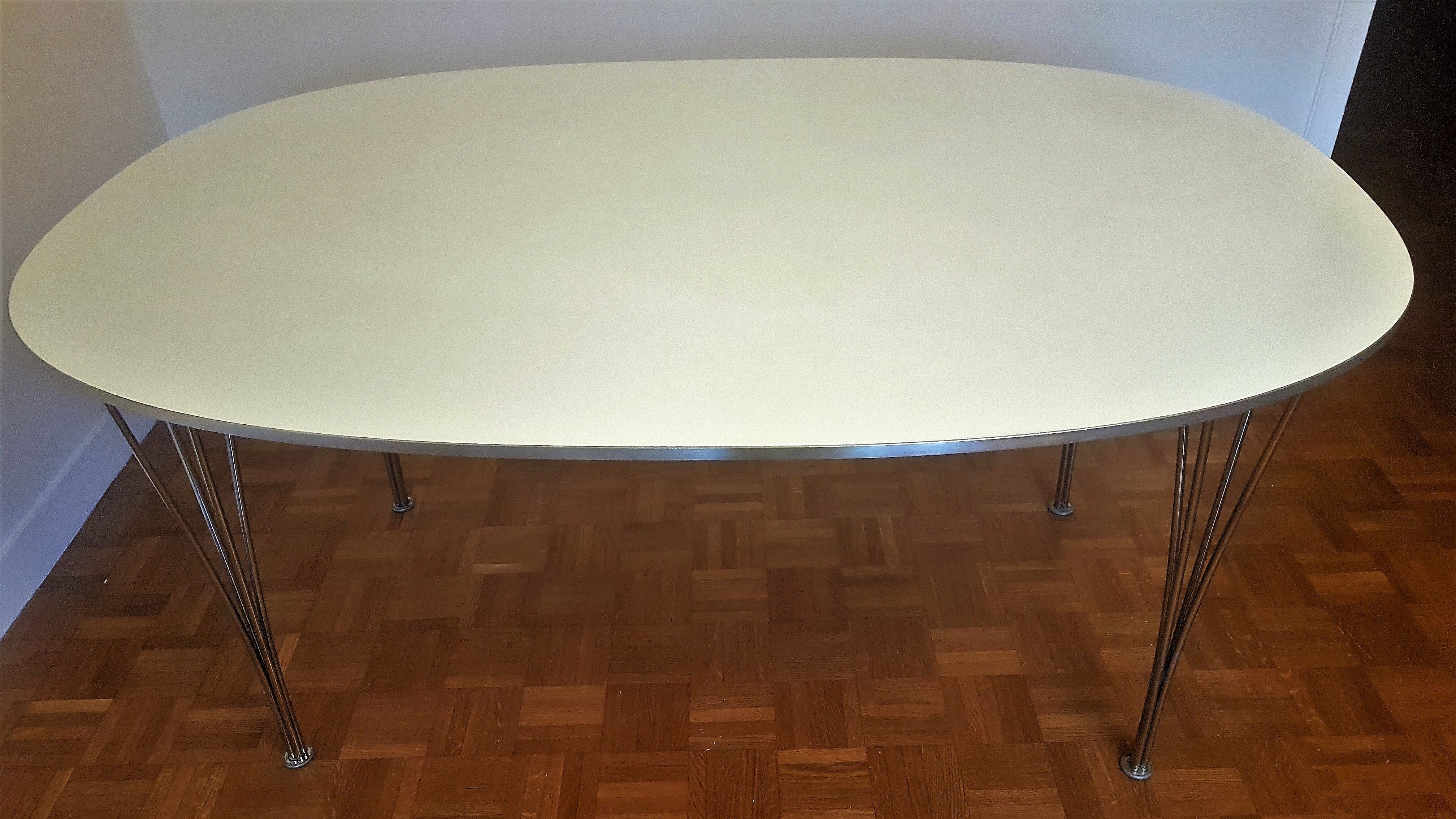 White Super-elliptical table, design by Piet Hein and Bruno Mathsson for Fritz Hansen