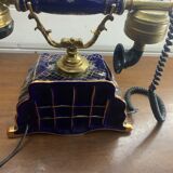 Téléphone de maison en porcelaine doré début XXeme