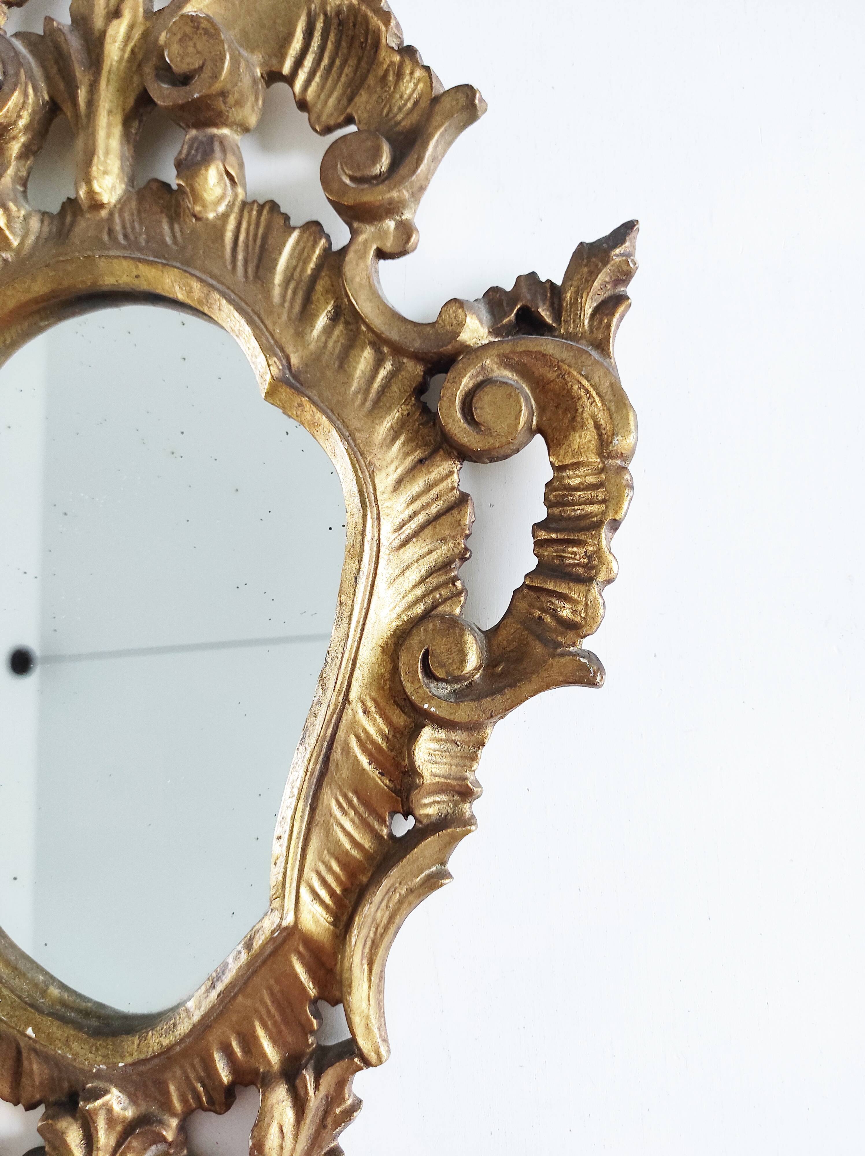 Gilded wood mirror, 56 x 32 cm