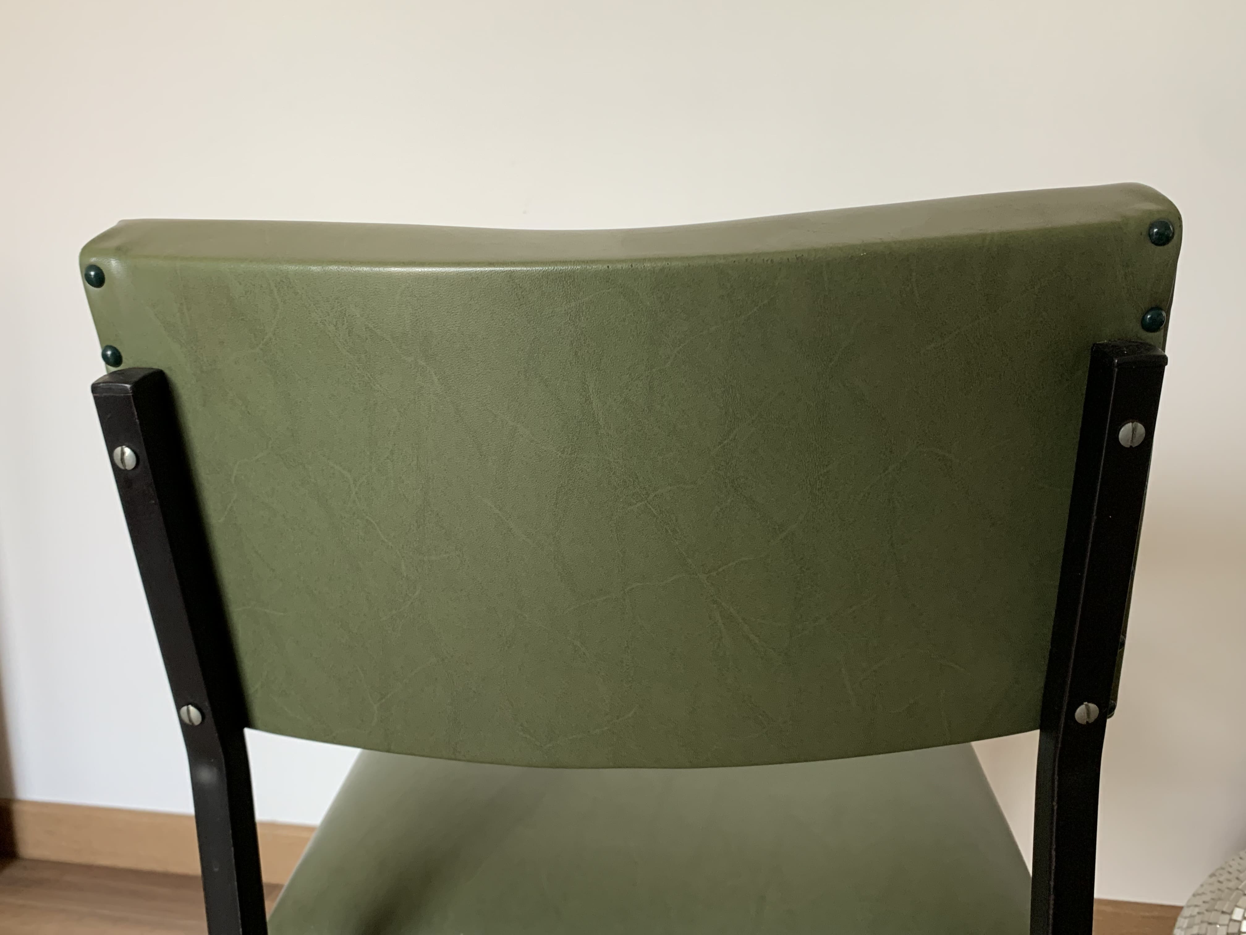 green and metal skai chair