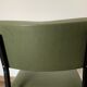 green and metal skai chair