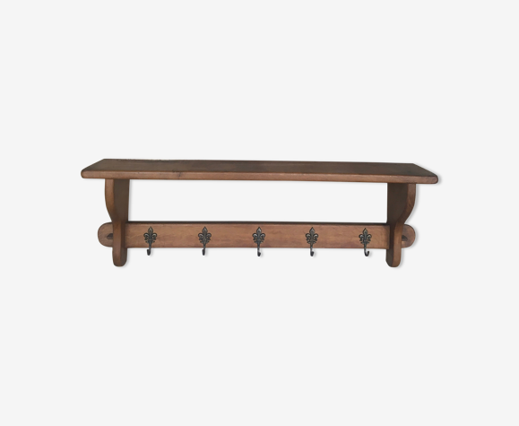 Coat-hanger with brass hooks
