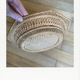 Woven natural fibre basket