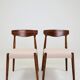 Set of two dining chairs in Scandinavian design.