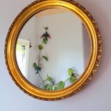 Round golden mirror