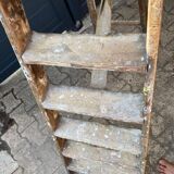 Antique authentic painter's stepladder in vintage patinated wood